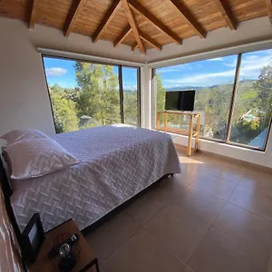 Con Bano Privado En Ubicada En Santa Elena Habitación en casa particular Santa Elena (Antioquia)
